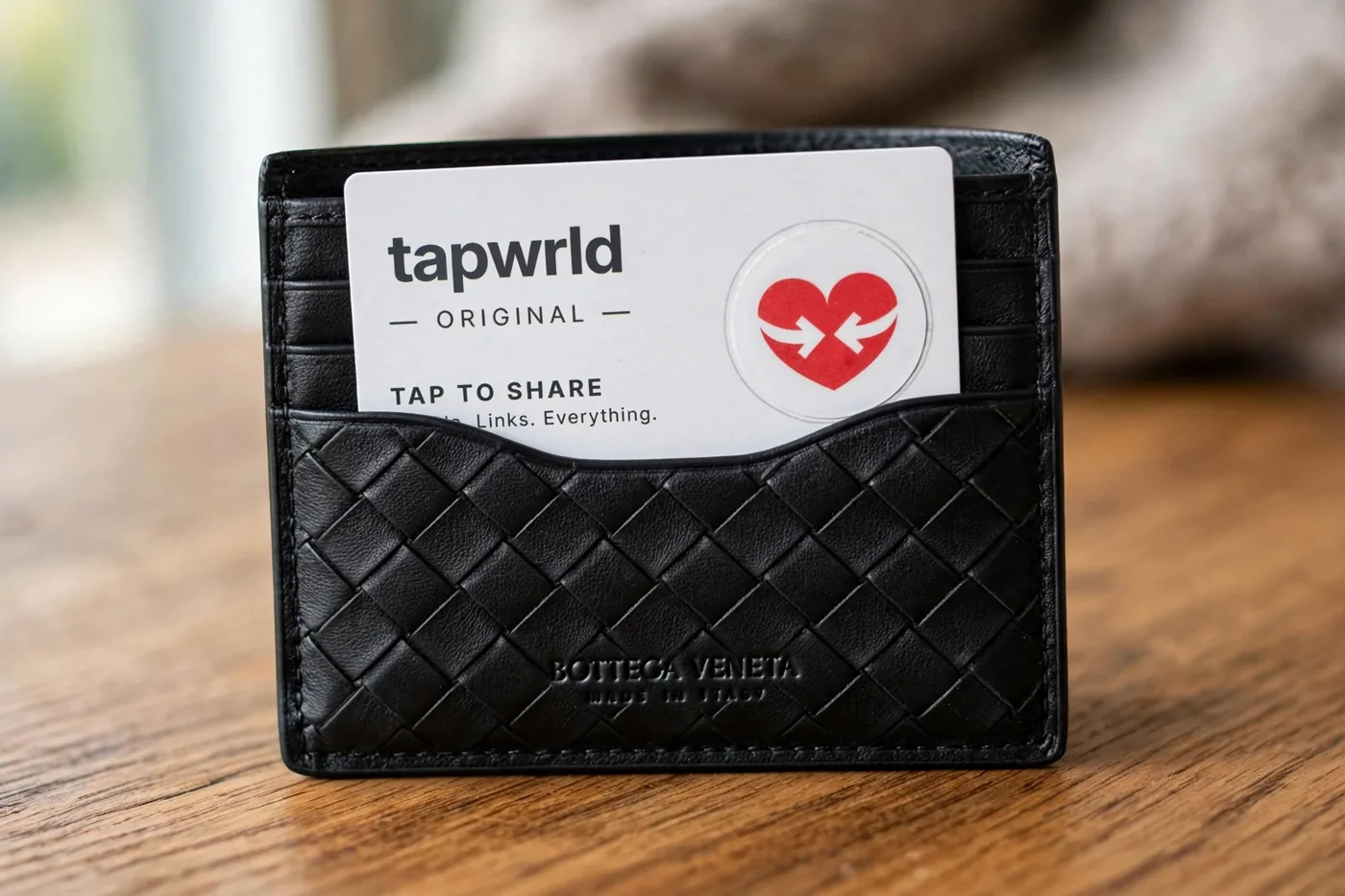 Tapwrld card in a leather wallet