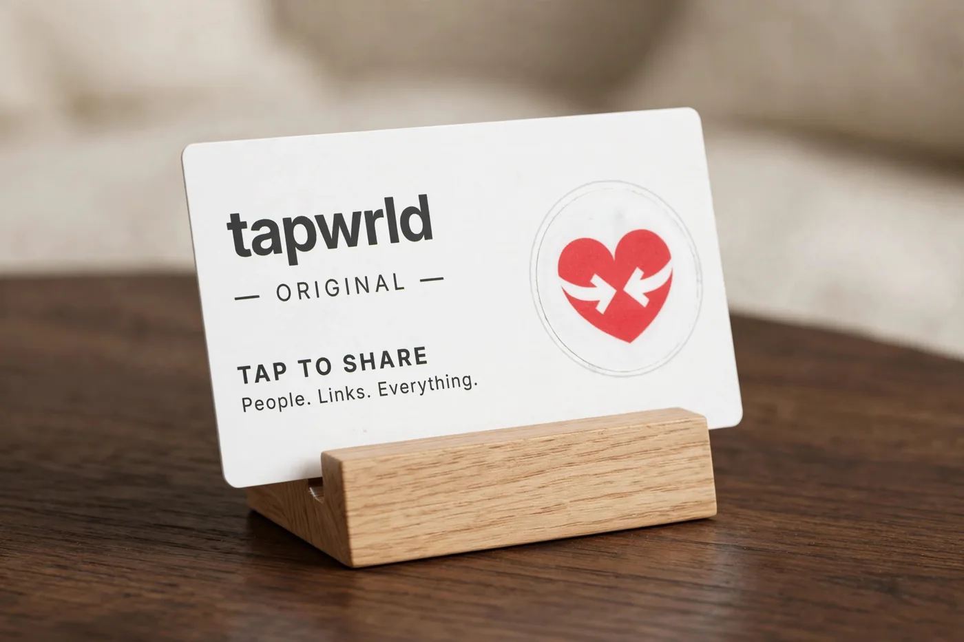 Tapwrld card on a wooden display stand